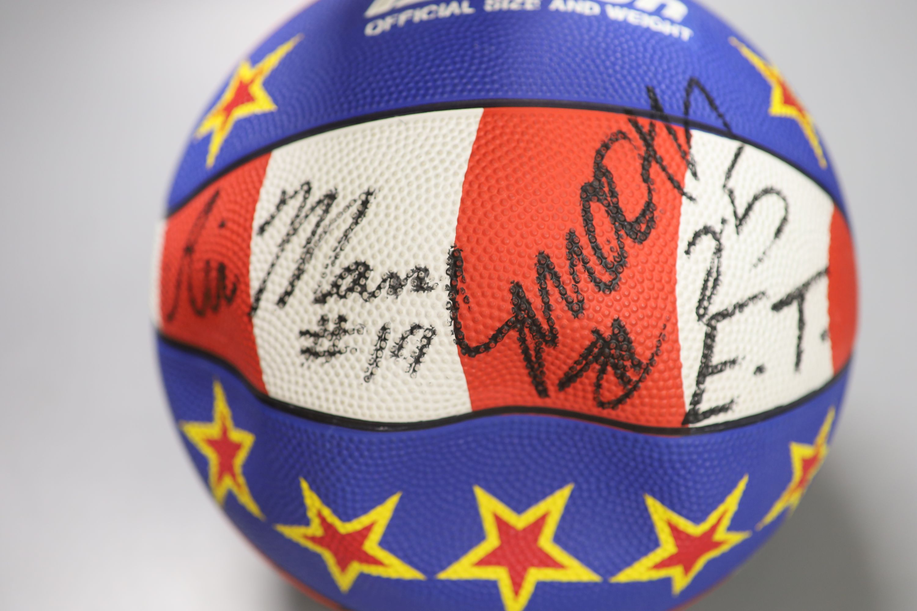 A Harlem Globe Trotters signed basketball